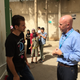 Andrew Harper speaks with a refugee in Jordan.